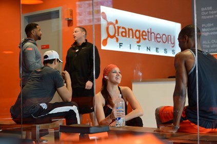 Customers in Orangetheory Fitness lobby